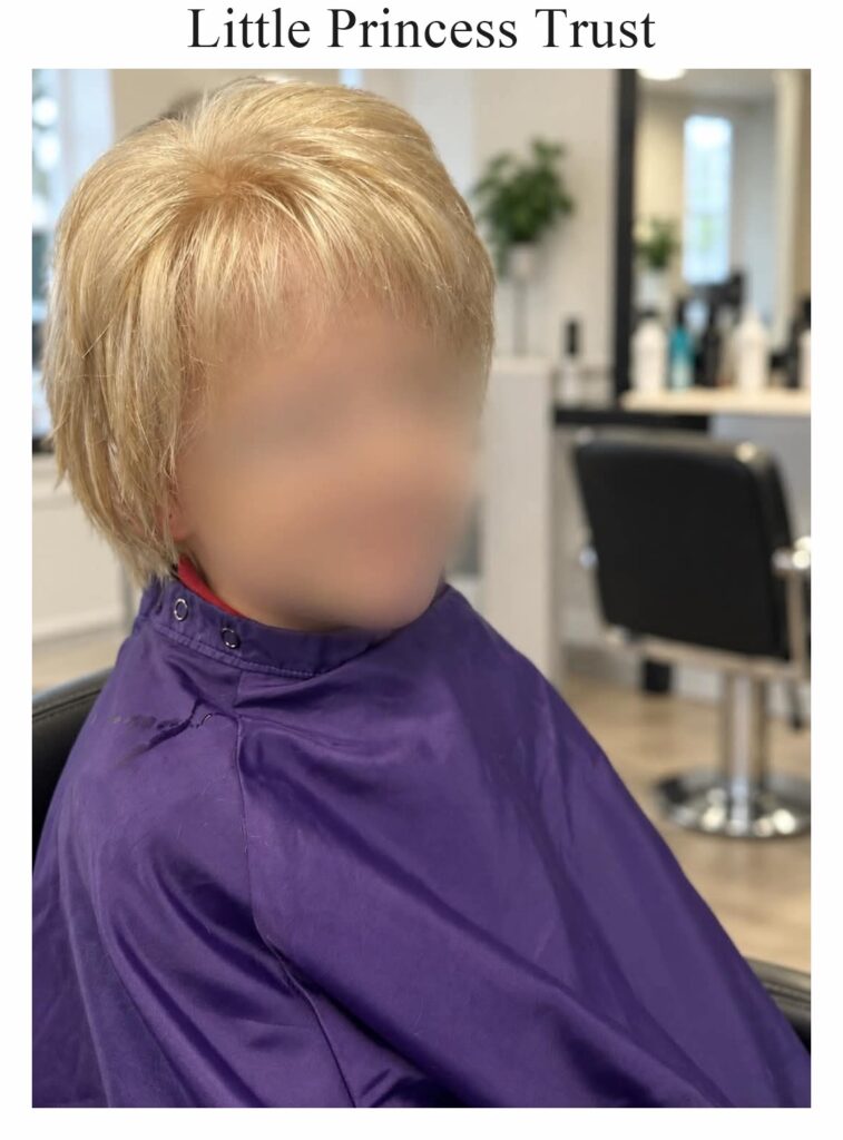 Little Princess Trust wig: a short blonde style, worn by a child