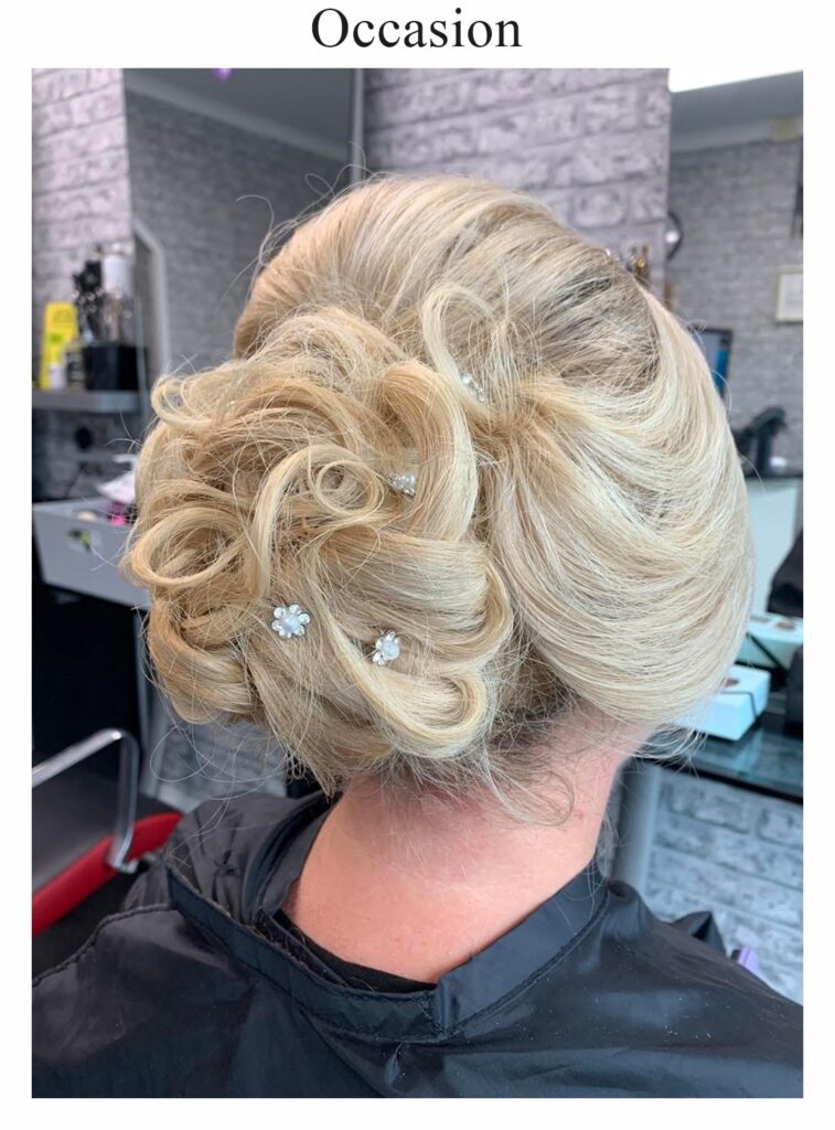 Occasion hair: a blonde updo of pinned curls