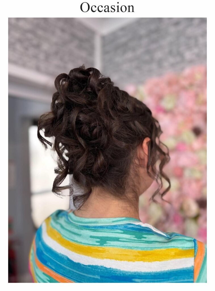 Occasion hair: an updo of dark curls